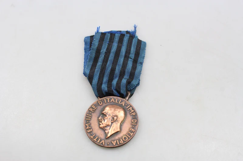 AOI-Medaille, „Viele Feinde, viel Ehre“