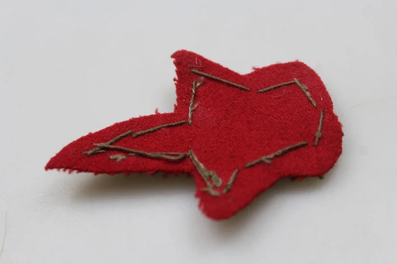 Abzeichen auf der Mütze von Oberstkommandant Autieri REI WW2