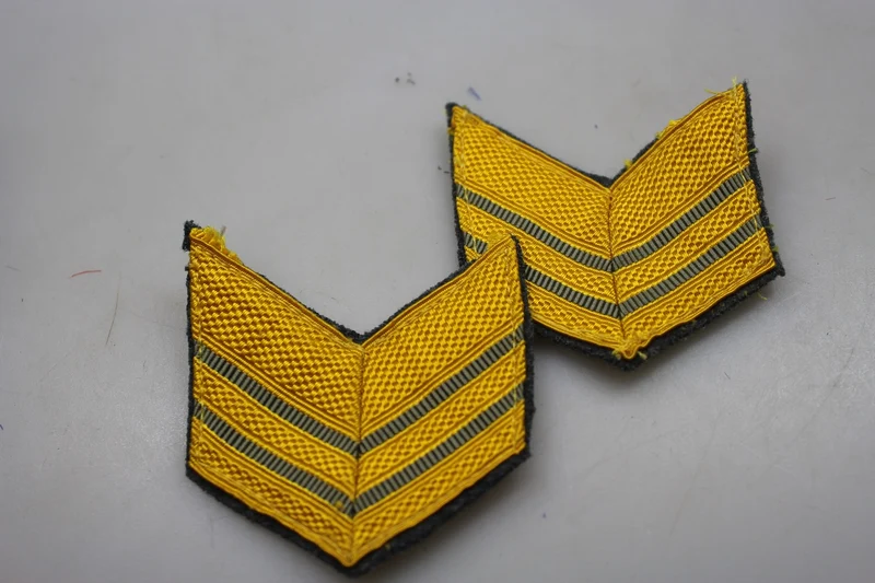 Zwei degradierte Sergeant Major-Ränge REI WW2