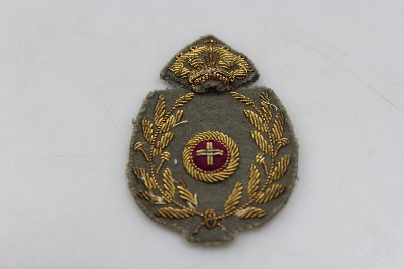 Offiziersmützenabzeichen des Militärkommissariats REI aus dem Zweiten Weltkrieg