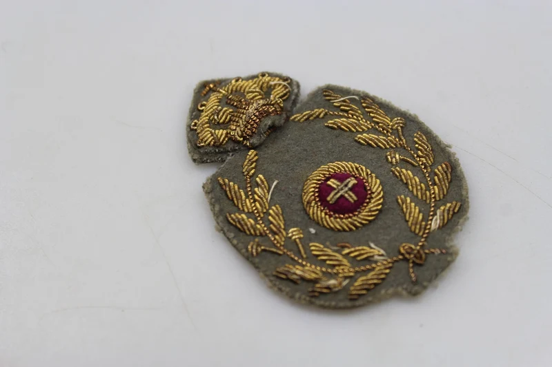 Offiziersmützenabzeichen des Militärkommissariats REI aus dem Zweiten Weltkrieg
