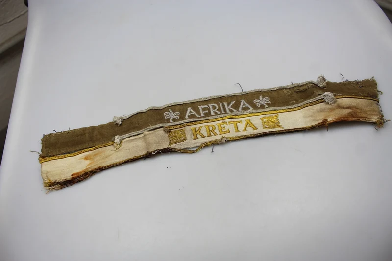 Paar kretische und afrikanische WH-Armbänder aus dem Zweiten Weltkrieg