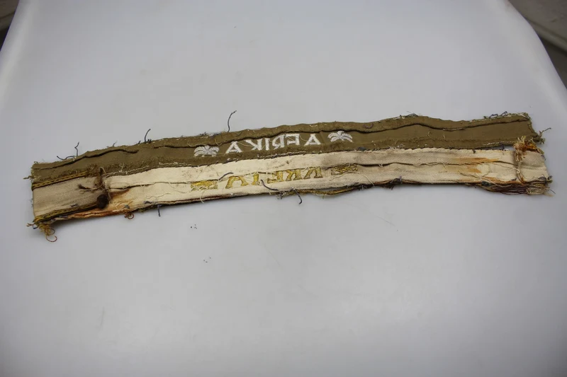 Paar kretische und afrikanische WH-Armbänder aus dem Zweiten Weltkrieg