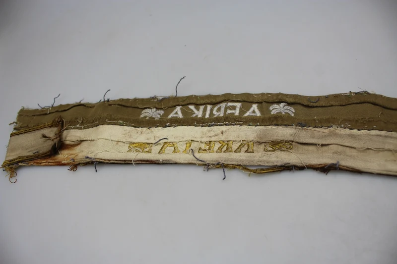 Paar kretische und afrikanische WH-Armbänder aus dem Zweiten Weltkrieg