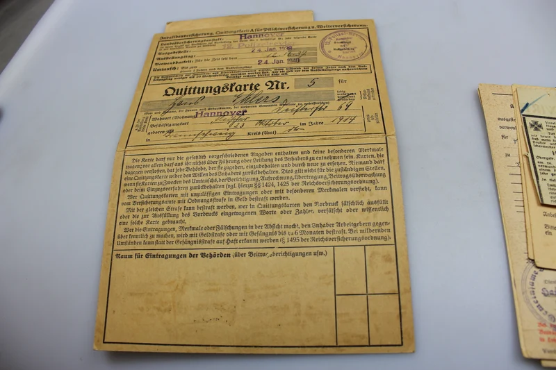 Arbeitsbuch, weitere Dokumente und zwei Einzelfotos