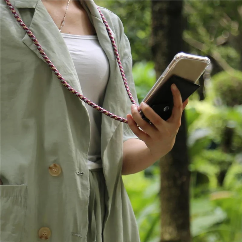 Cadorabo Handy Kette kompatibel mit Apple iPhone 12 / 12 PRO Silikon Schutzhülle mit Silbernen Ringen, Kordel Band und abnehmbarem Etui