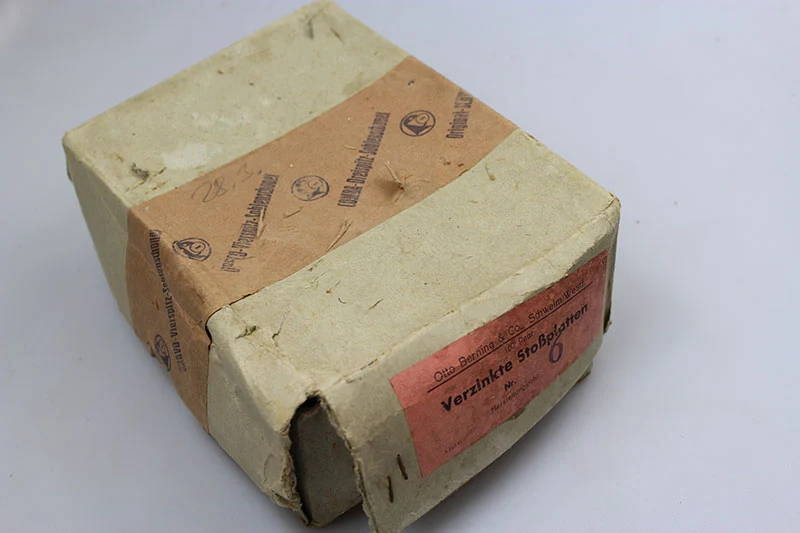 Verpackung "Verzinkte Stossplatten N°6"