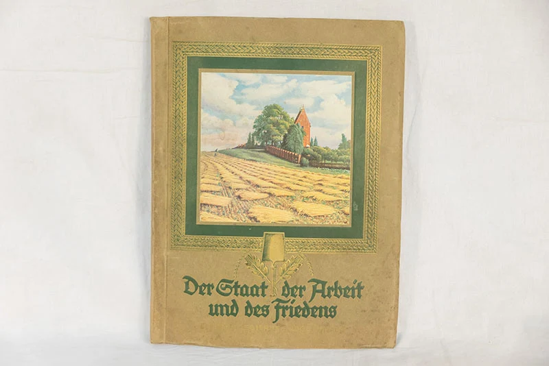 Stickeralbum "Der Staat der Arbeit und des Friedens".