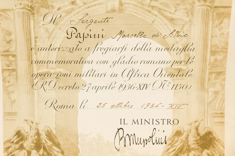 Paar AOI-Ordensurkunden und Verdienstkreuz