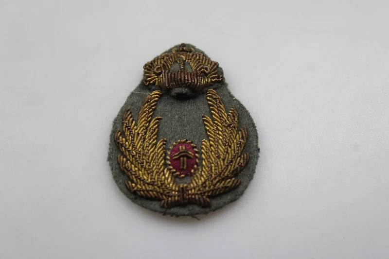 Emblem der Offiziersmütze des REI-Kommissariats aus dem Zweiten Weltkrieg