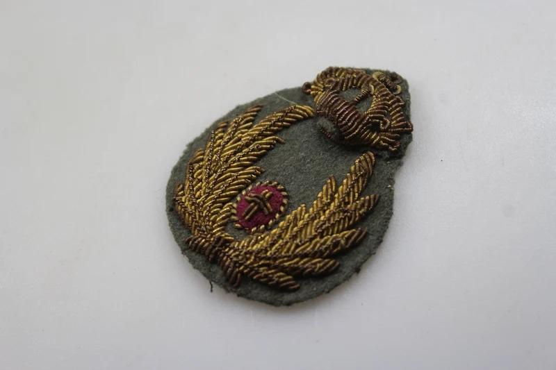 Emblem der Offiziersmütze des REI-Kommissariats aus dem Zweiten Weltkrieg