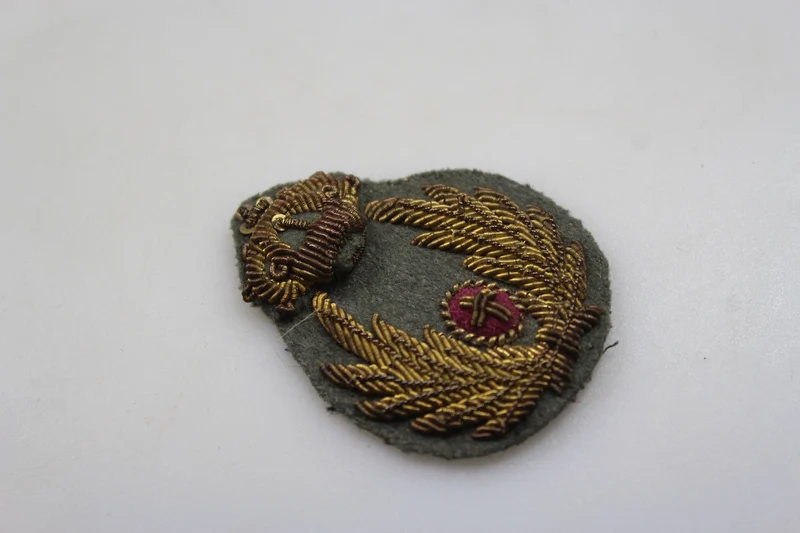 Emblem der Offiziersmütze des REI-Kommissariats aus dem Zweiten Weltkrieg