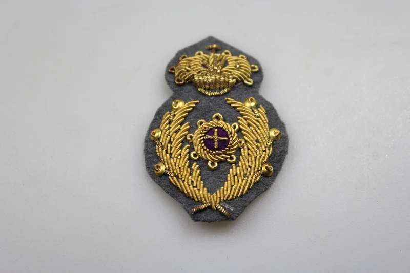 Emblem der Offiziersmütze des REI-Militärkommissariats aus dem Zweiten Weltkrieg