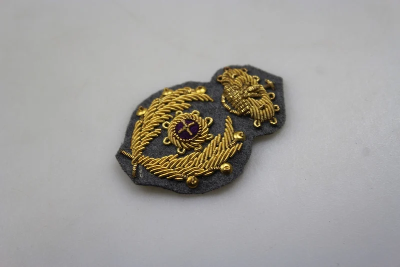Emblem der Offiziersmütze des REI-Militärkommissariats aus dem Zweiten Weltkrieg