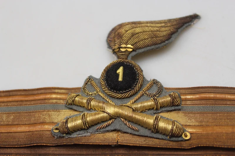 Majorsabzeichen und Offiziersmütze „Voloire“ M.34