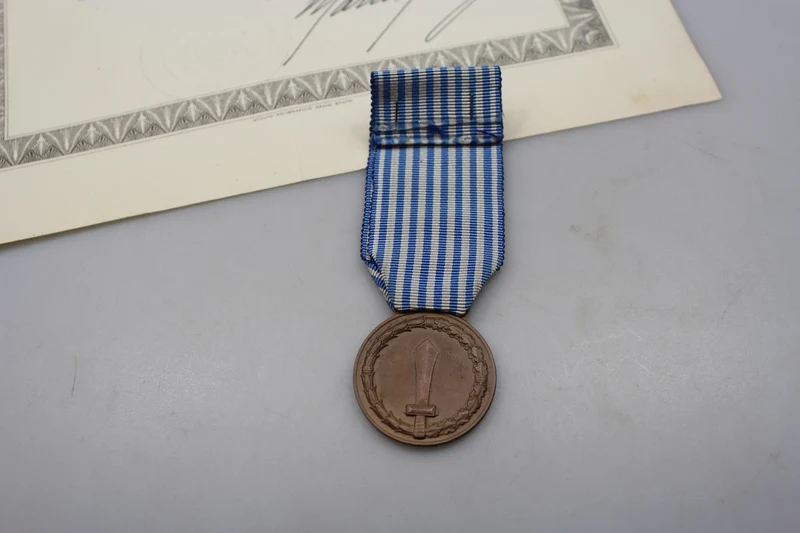 Verdienstmedaille für langes Kommando mit REI-Zertifikat