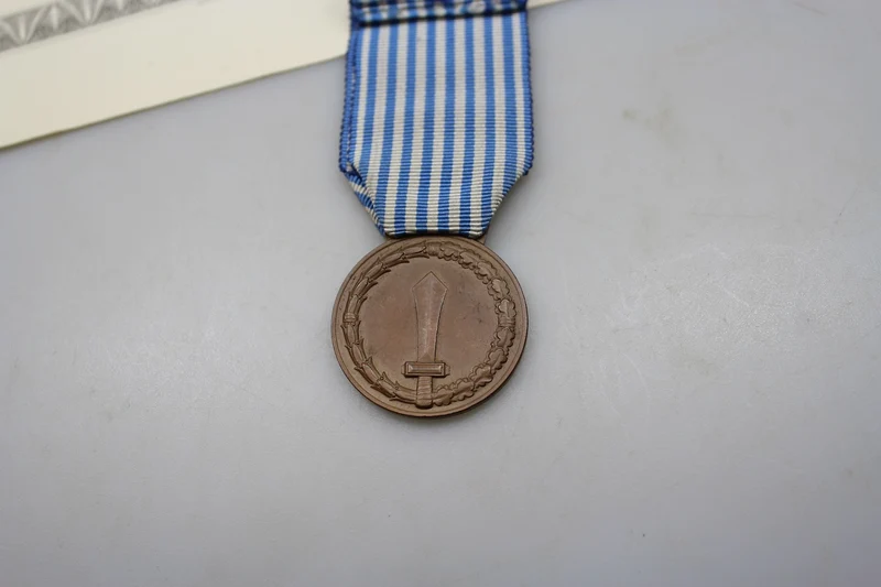 Verdienstmedaille für langes Kommando mit REI-Zertifikat