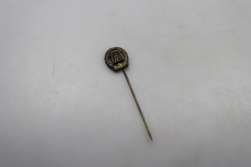 Bronzener DRL-Pin