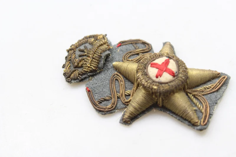Abzeichen für Mütze 34 REI WW 2 Gesundheitsoffizier