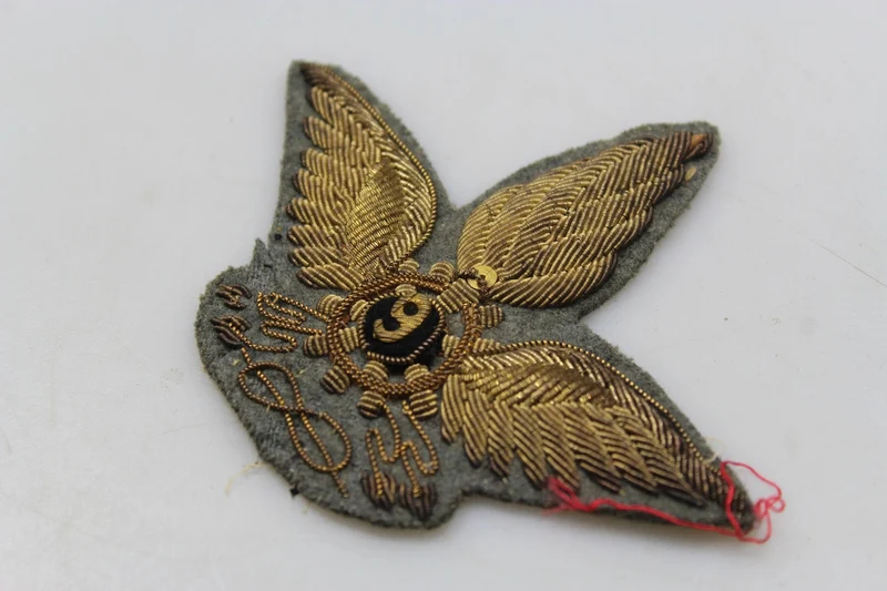 Offizielle Mützendekoration M.34 REI WW 2