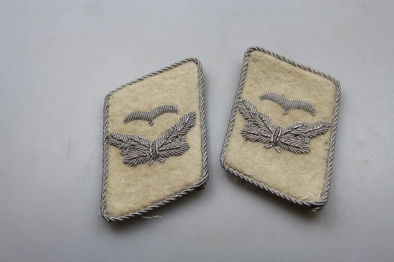 Repro offizielle HG-Insignien