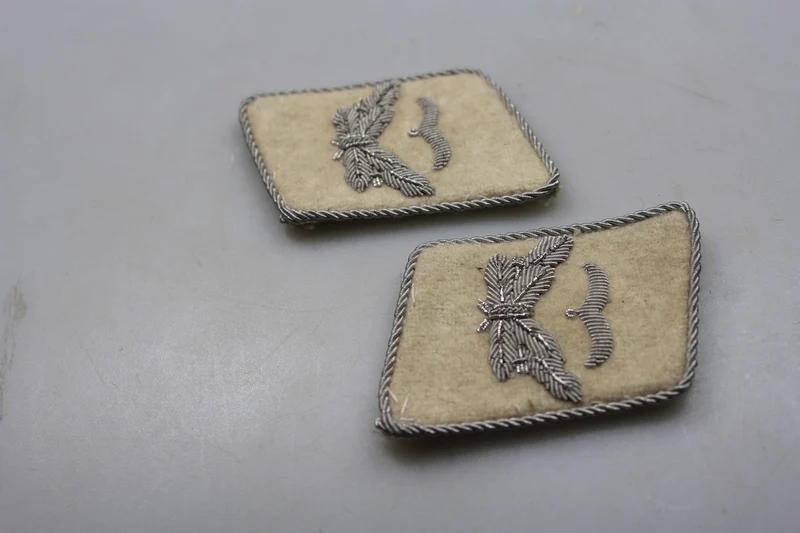 Repro offizielle HG-Insignien
