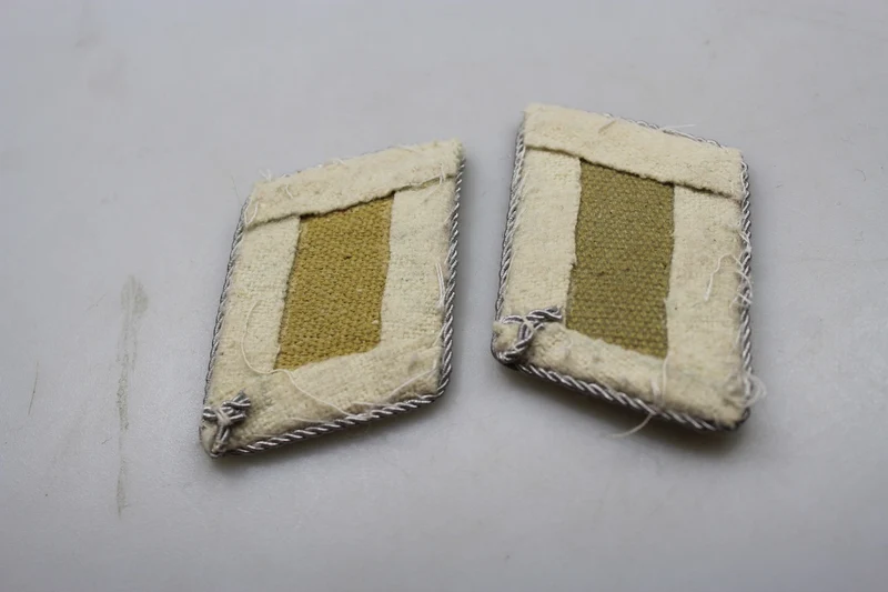 Repro offizielle HG-Insignien