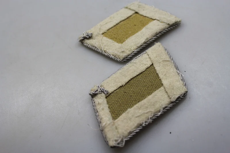 Repro offizielle HG-Insignien