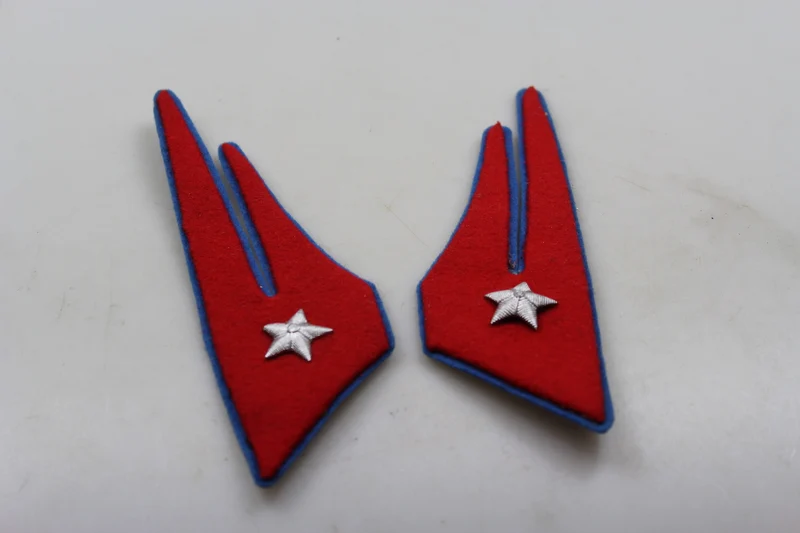 Paar offizielle M.34 REI-Insignien aus dem 2. Weltkrieg