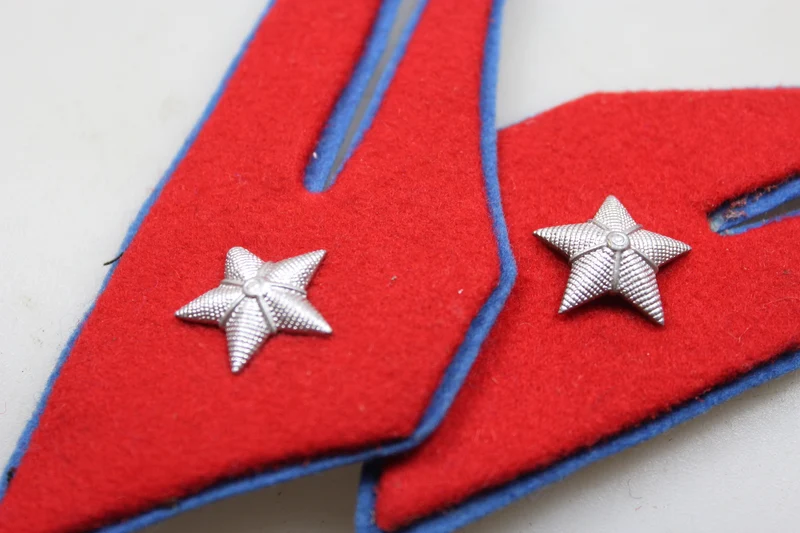 Paar offizielle M.34 REI-Insignien aus dem 2. Weltkrieg
