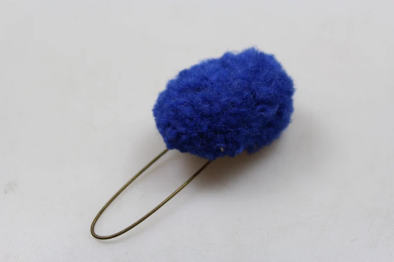 Blaue Quaste für REI Alpenmütze