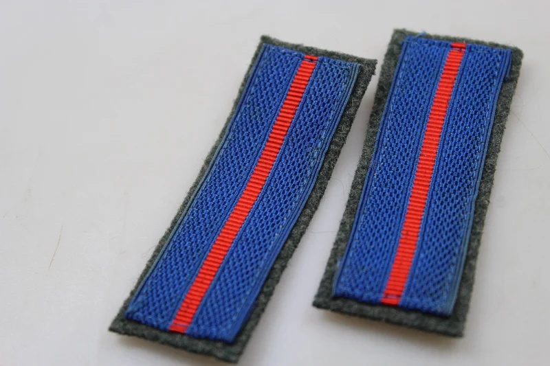 Paar REI-Insignien aus dem 2. Weltkrieg