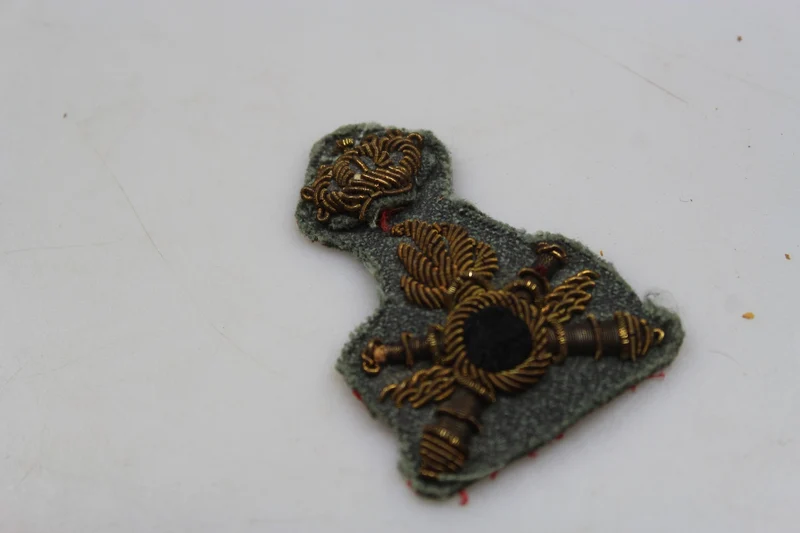 Emblem der REI-Flugabwehrartillerieoffiziersmütze aus dem Zweiten Weltkrieg