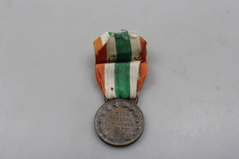 Medaille der italienischen Einheit (1848–1918) mit Band. Gebraucht, guter Zustand.