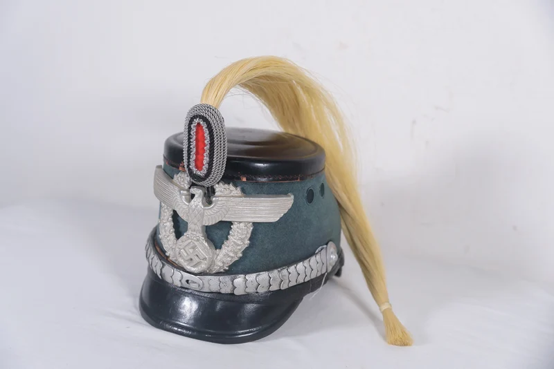 Tschako-Polizeibeamter