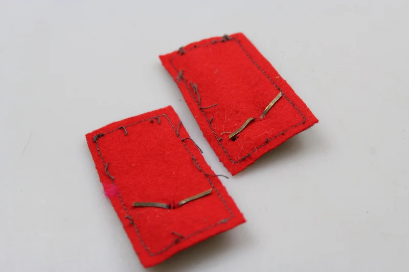 Paar offizielle REI-Insignien aus dem 2. Weltkrieg