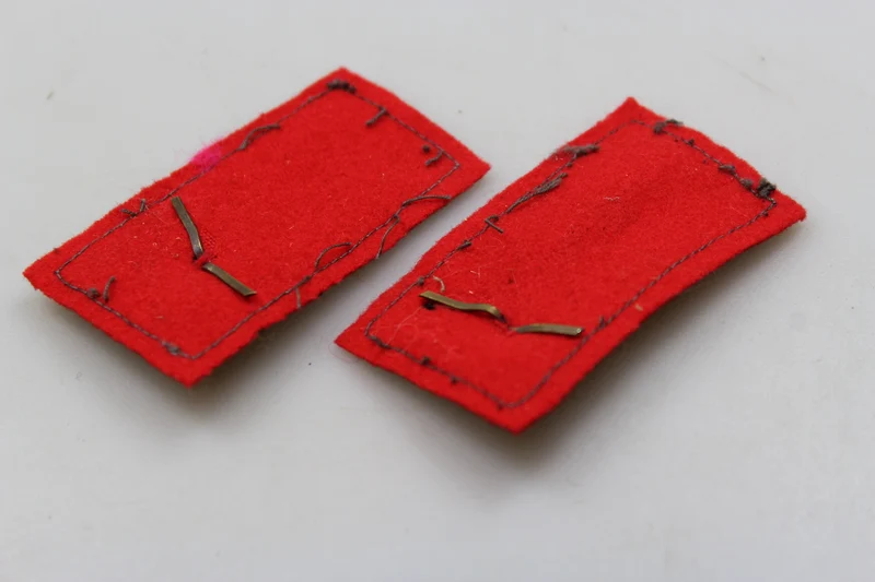 Paar offizielle REI-Insignien aus dem 2. Weltkrieg