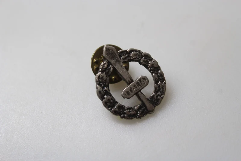 REPRO Anstecknadel zur Reduzierung von RSI