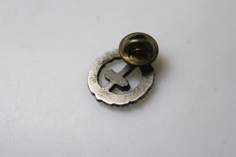 REPRO Anstecknadel zur Reduzierung von RSI