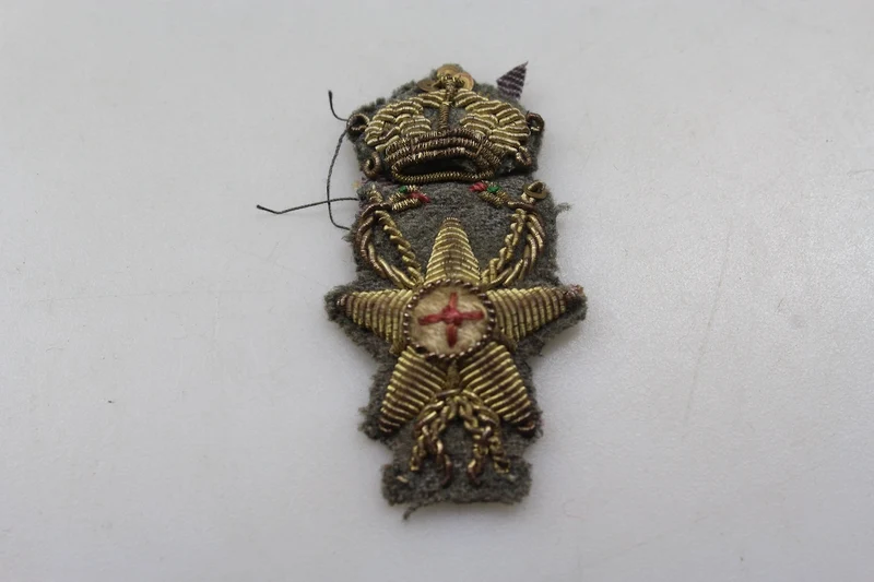 Offizielles Emblem des Gesundheitsdienstes von REI im Zweiten Weltkrieg