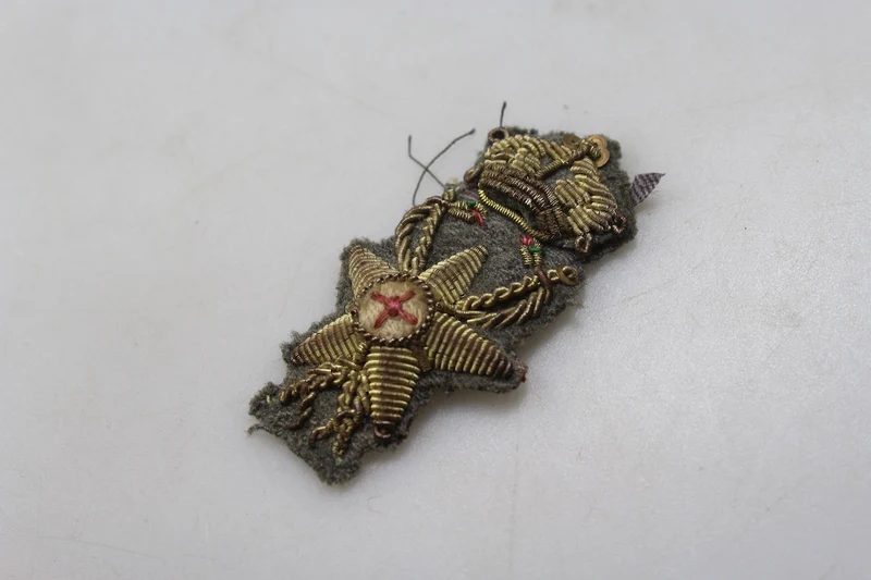 Offizielles Emblem des Gesundheitsdienstes von REI im Zweiten Weltkrieg
