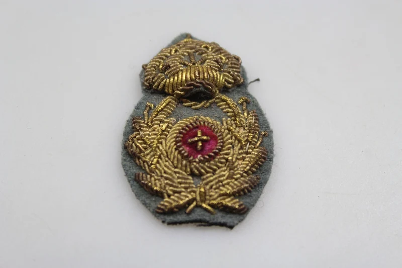 Emblem der Offiziersmütze des REI-Kommissariats aus dem Zweiten Weltkrieg