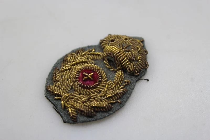 Emblem der Offiziersmütze des REI-Kommissariats aus dem Zweiten Weltkrieg