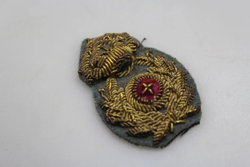 Emblem der Offiziersmütze des REI-Kommissariats aus dem Zweiten Weltkrieg