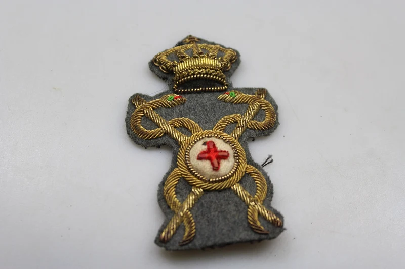 M.34 REI Apotheker-Offiziersmütze Emblem