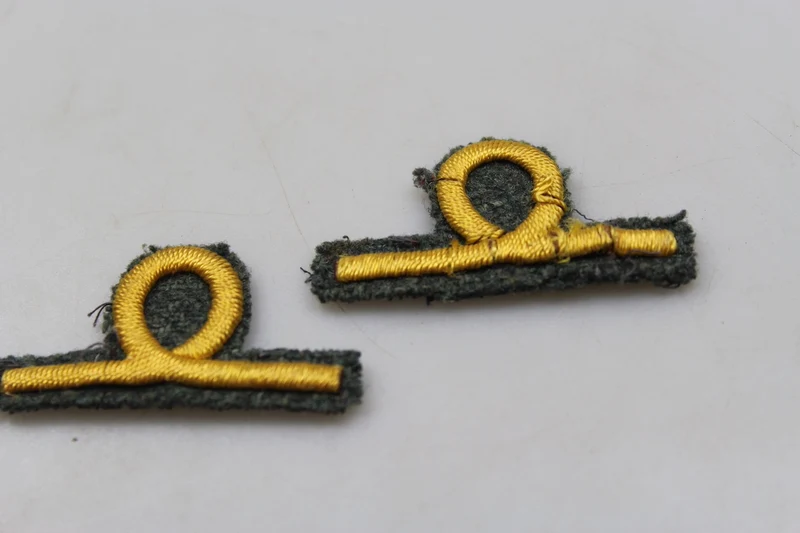 Paar „reduzierte“ M.40-Ränge für Leutnant REI WW2