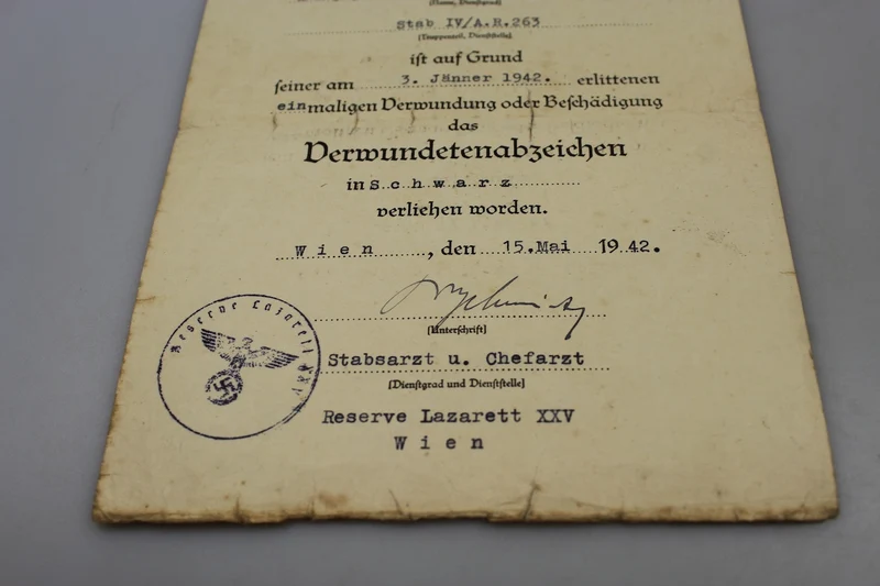 Paar Urkunden für Verwundete 2. und 3. Klasse WH WW2