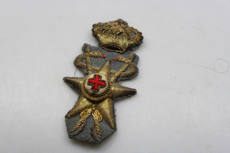 Offizielles Emblem der REI-Gesundheitskappe aus dem Zweiten Weltkrieg