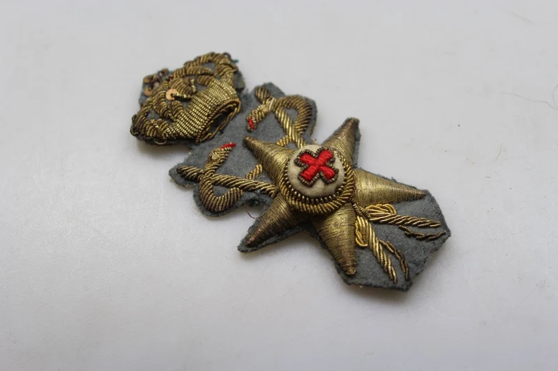 Offizielles Emblem der REI-Gesundheitskappe aus dem Zweiten Weltkrieg
