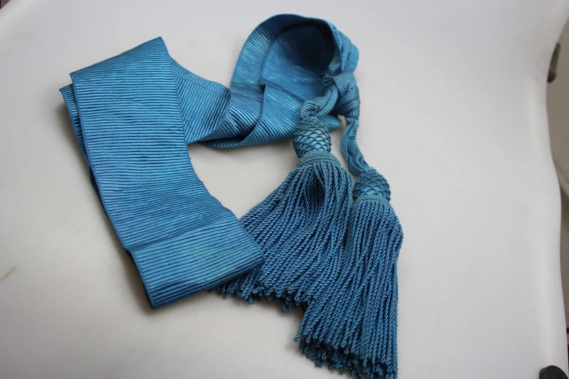 Blaue Schärpe für REI-Offizier